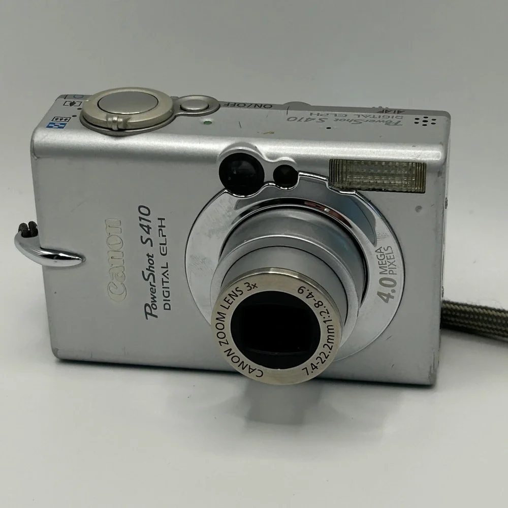 Canon PowerShot S410 Digital ELPH 4MP Camera w/original box for Parts/Repair